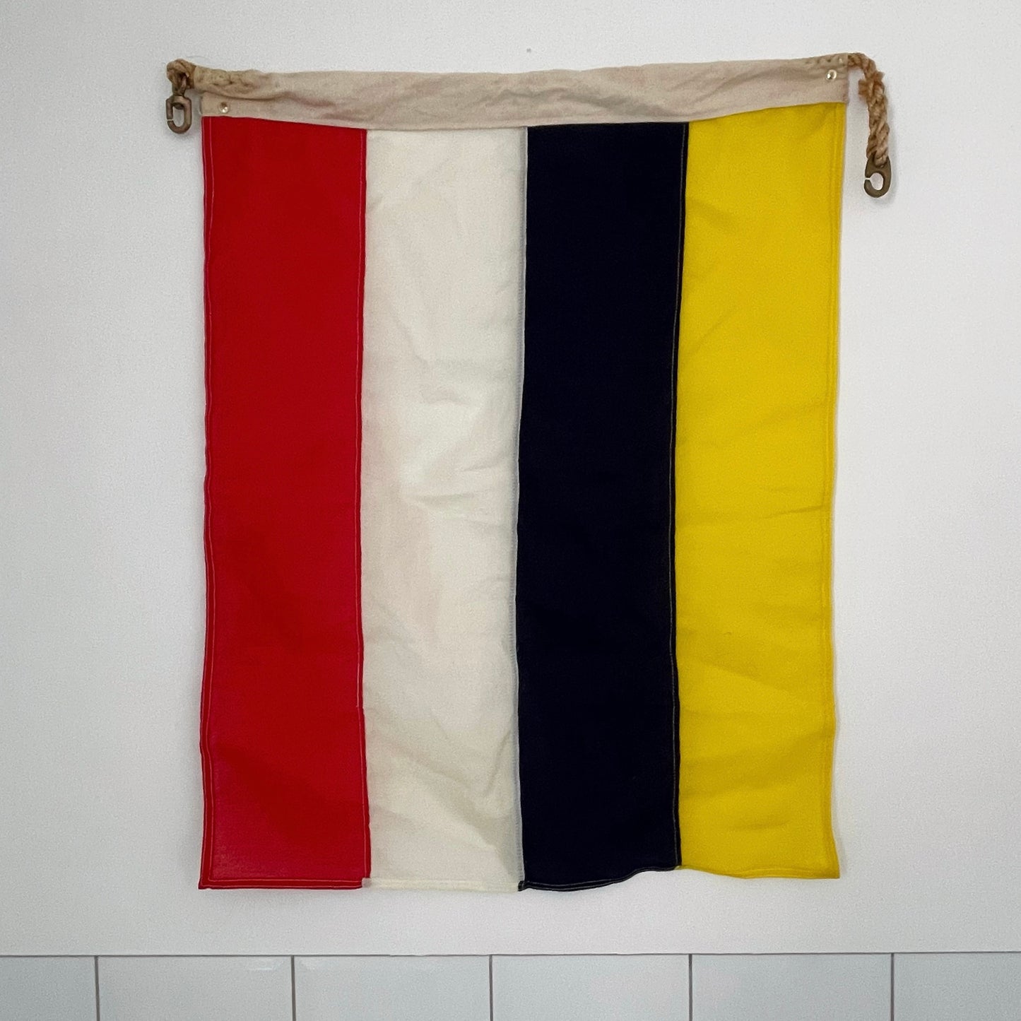 Vintage nautical flag from New Zealand - red, white, navy blue and yellow flag