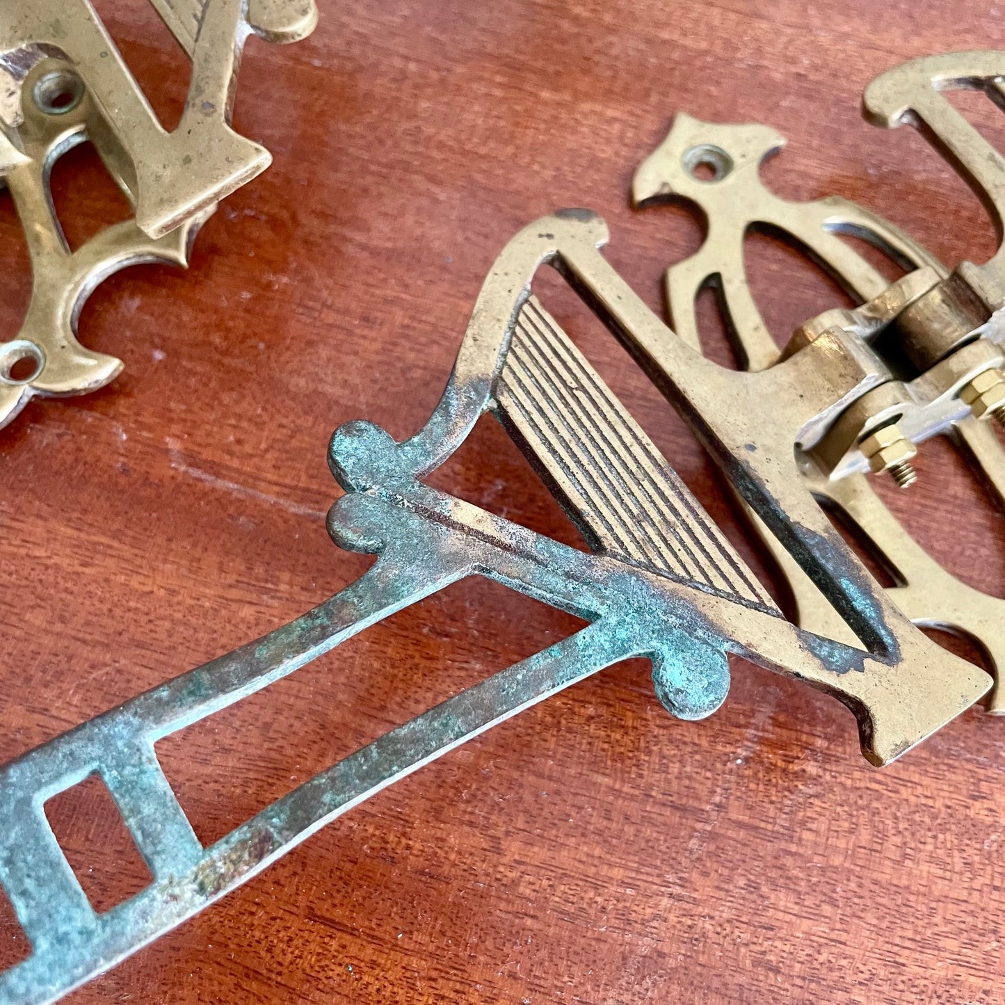 Pair of double arm antique harp sconces / Pianoforte brass candle holders