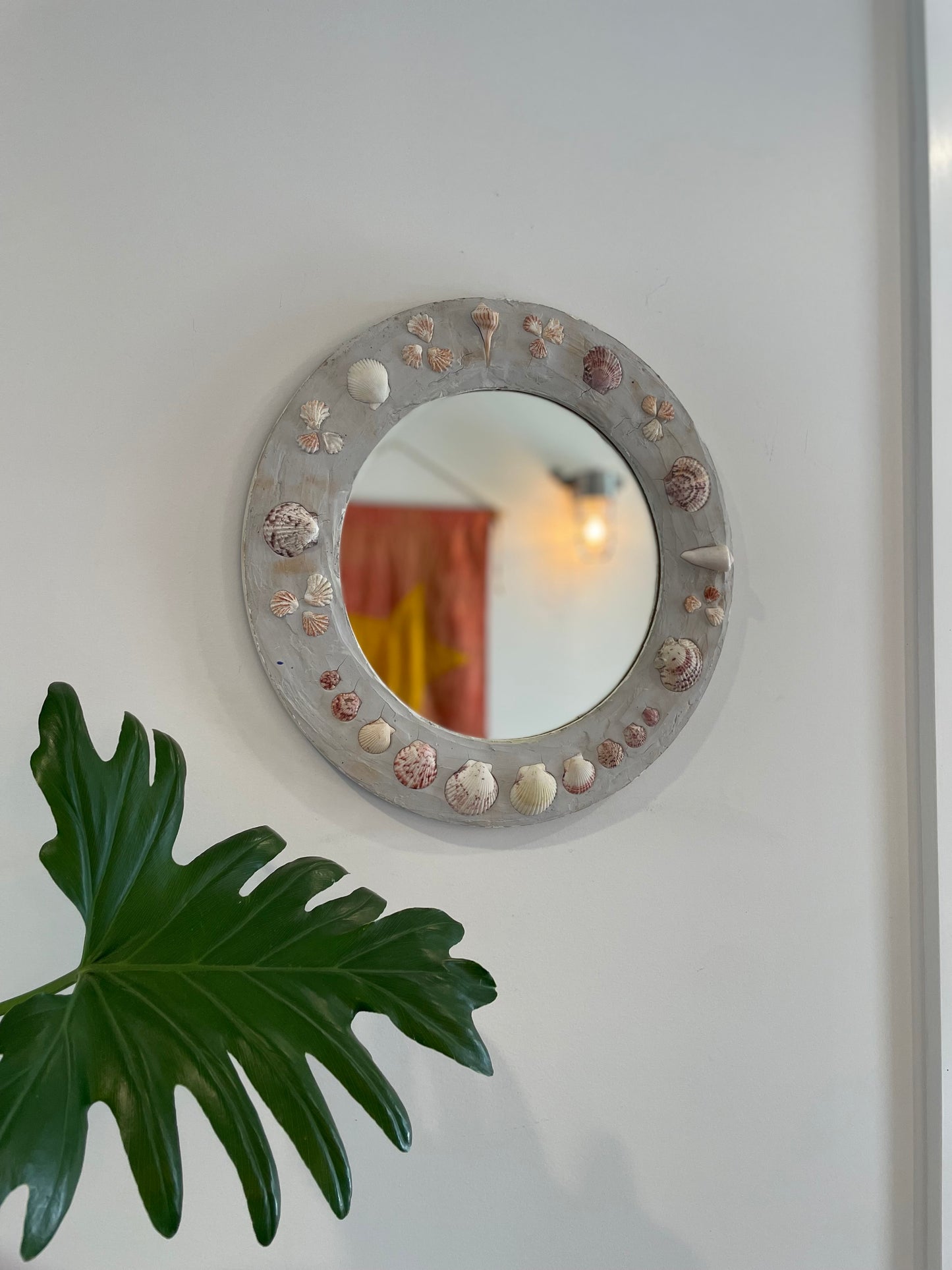 Shell Cottage - Round shell mirror with gray plaster