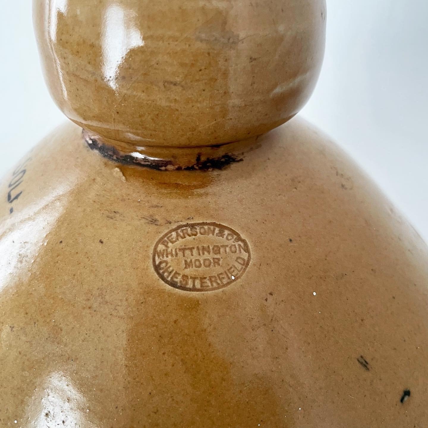 Extra large, antique stonewear jug stamped with New Zealand silver ferns