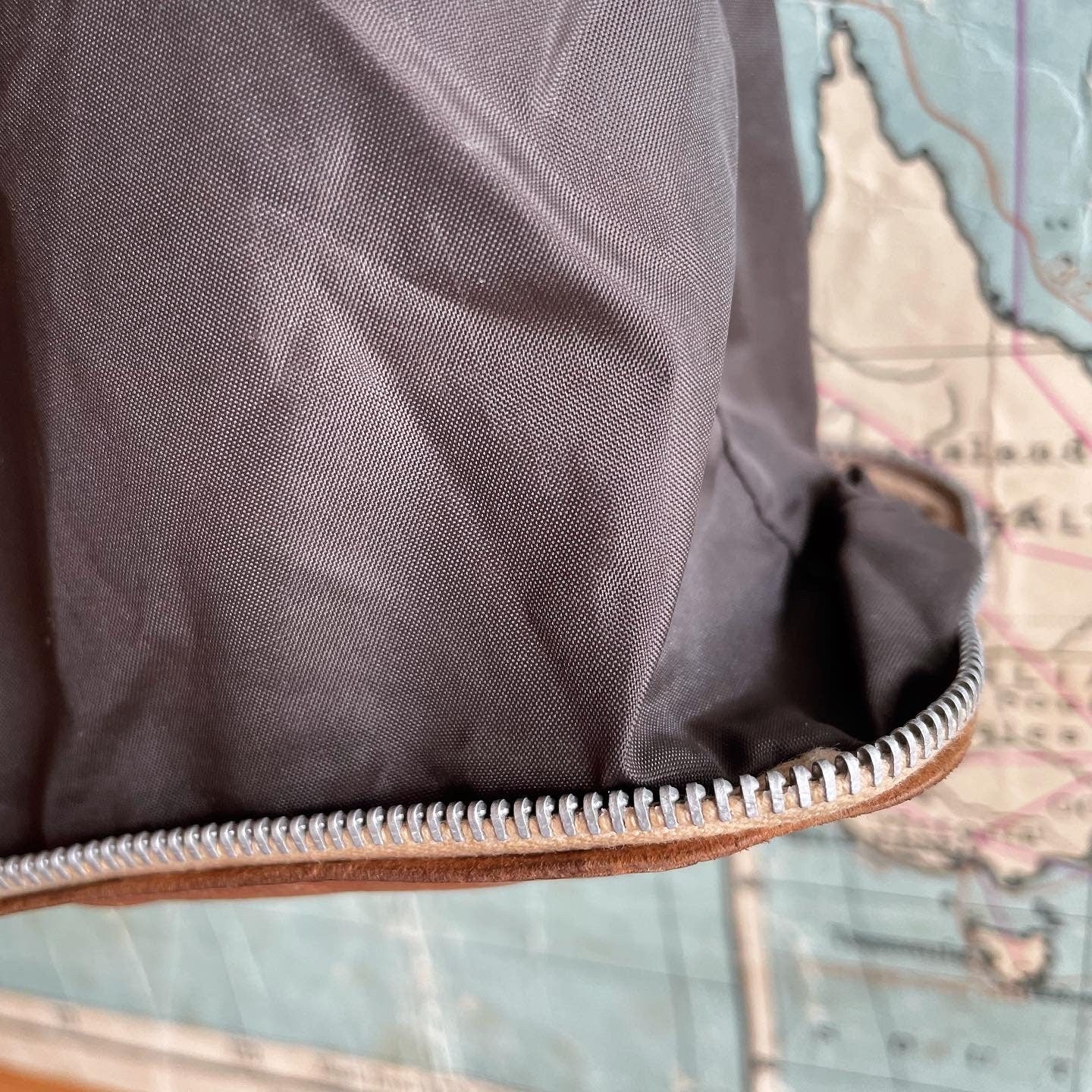 Compact zip up tote bag from New Zealand - tooled leather
