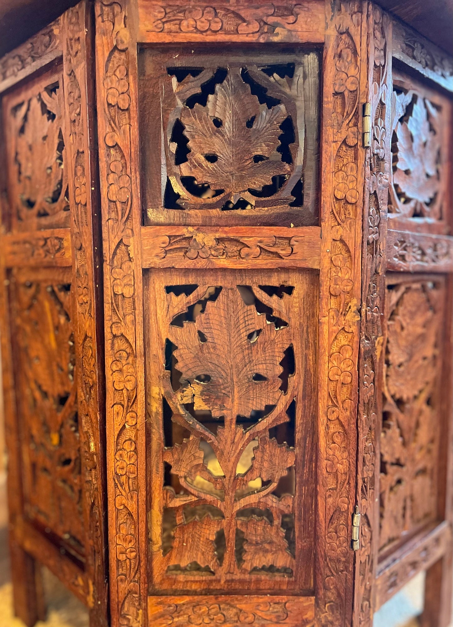 Octagonal hand-carved side table from India with bone inlay