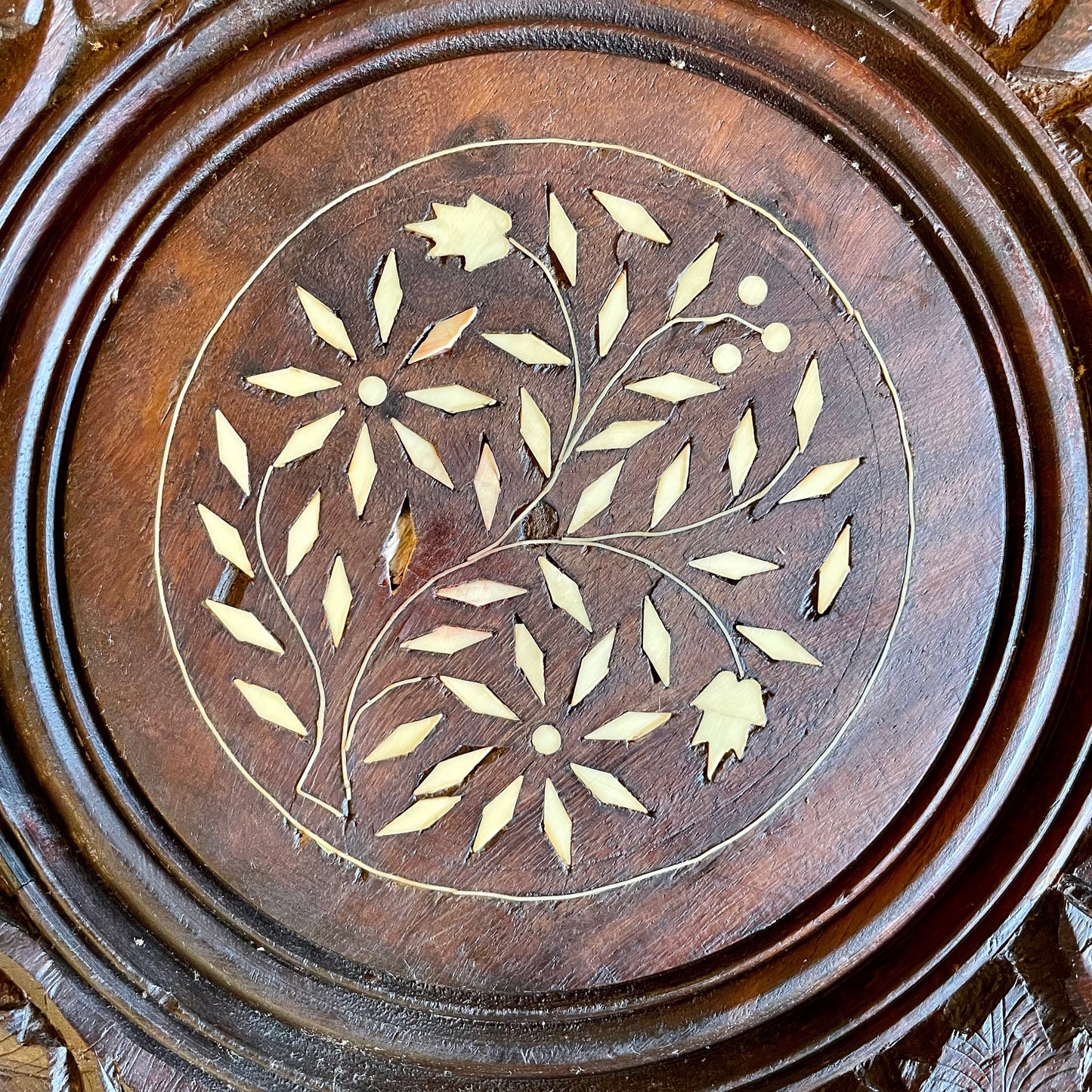 Octagonal hand-carved side table from India with bone inlay