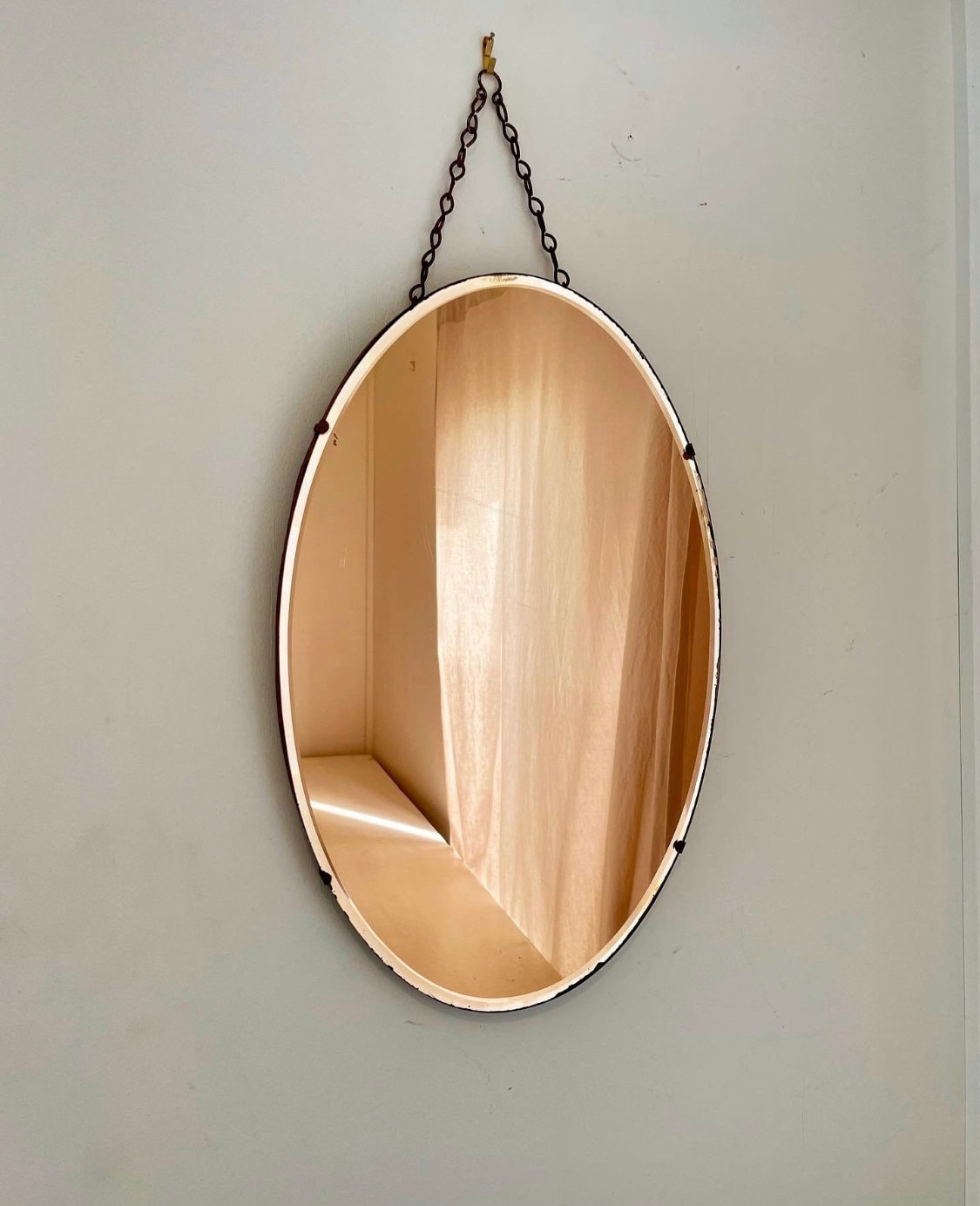 Art Deco mirror in a peachy pink color - amber tone antique beveled mirror