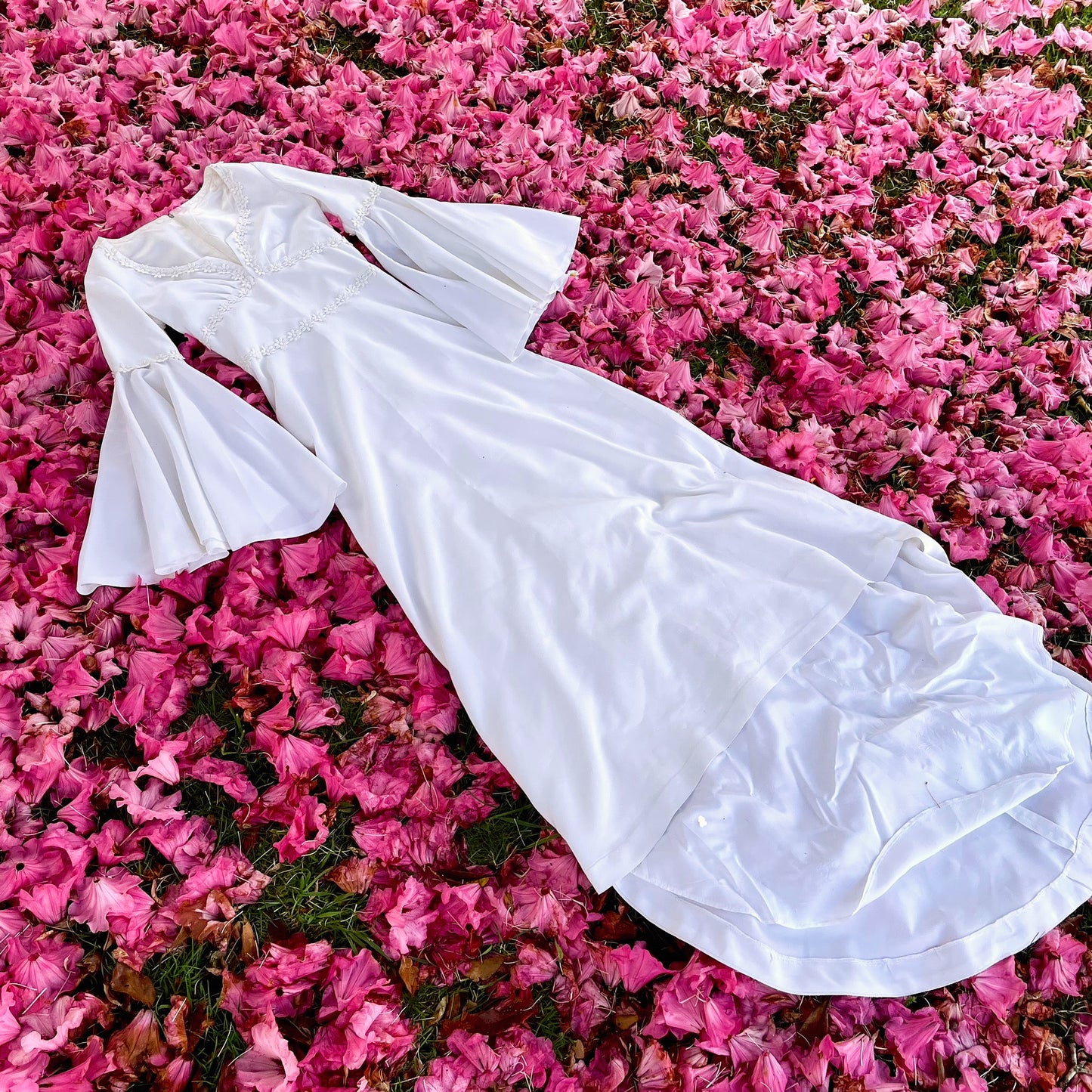 The Ophelia Dress - vintage 1970’s medieval style wedding dress with daisy chain details and bell sleeves