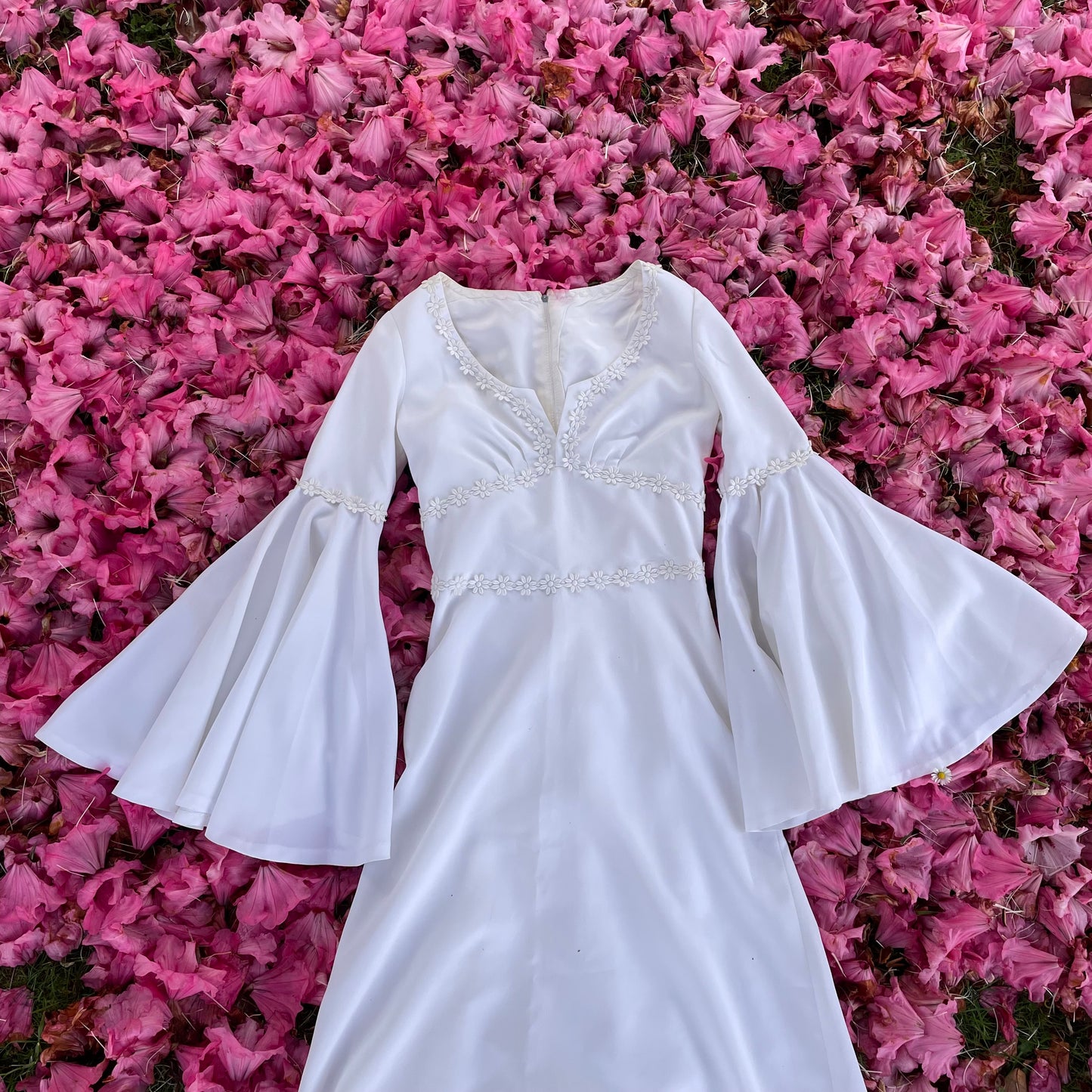 The Ophelia Dress - vintage 1970’s medieval style wedding dress with daisy chain details and bell sleeves