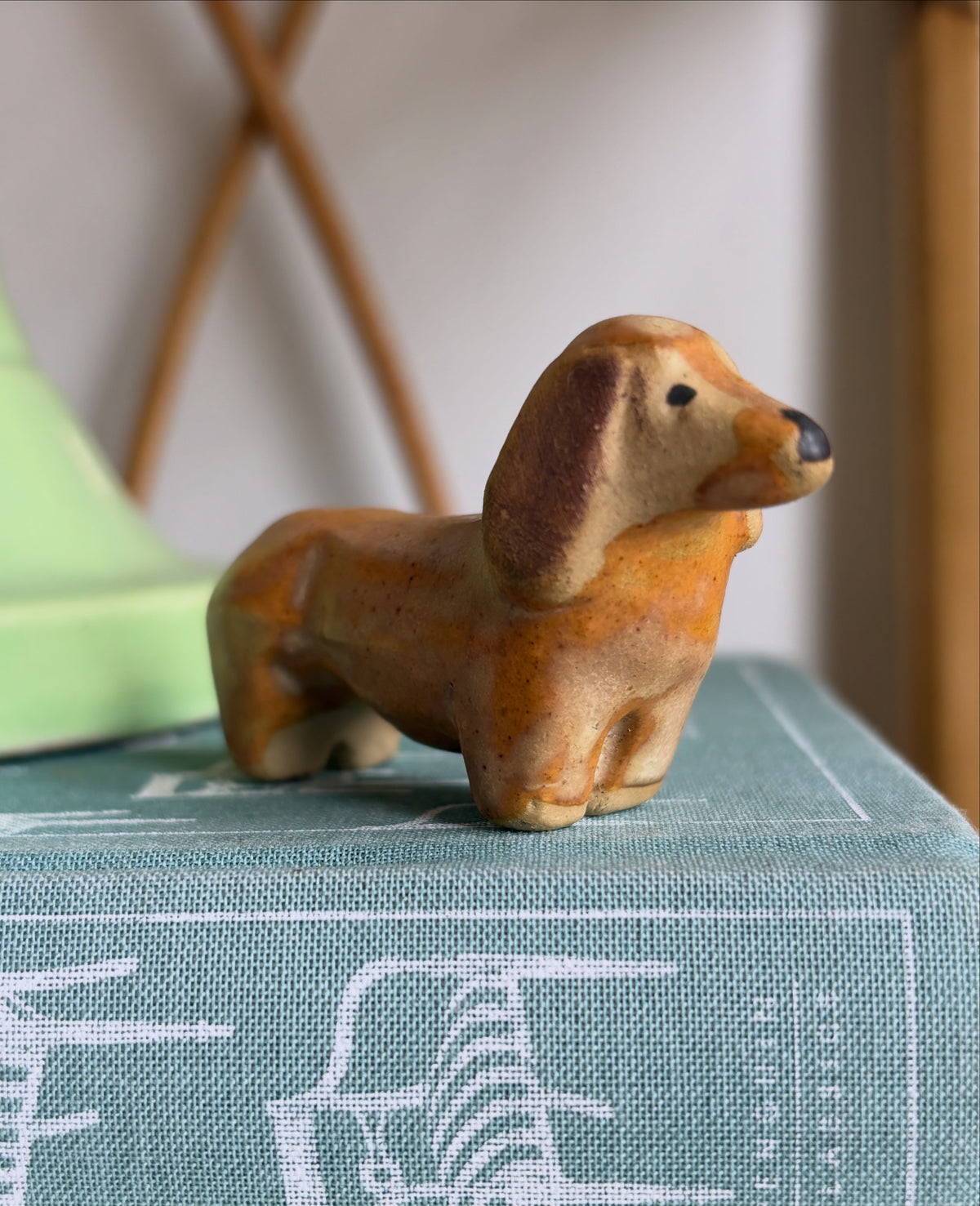 Adorable stoneware dachshund figurine