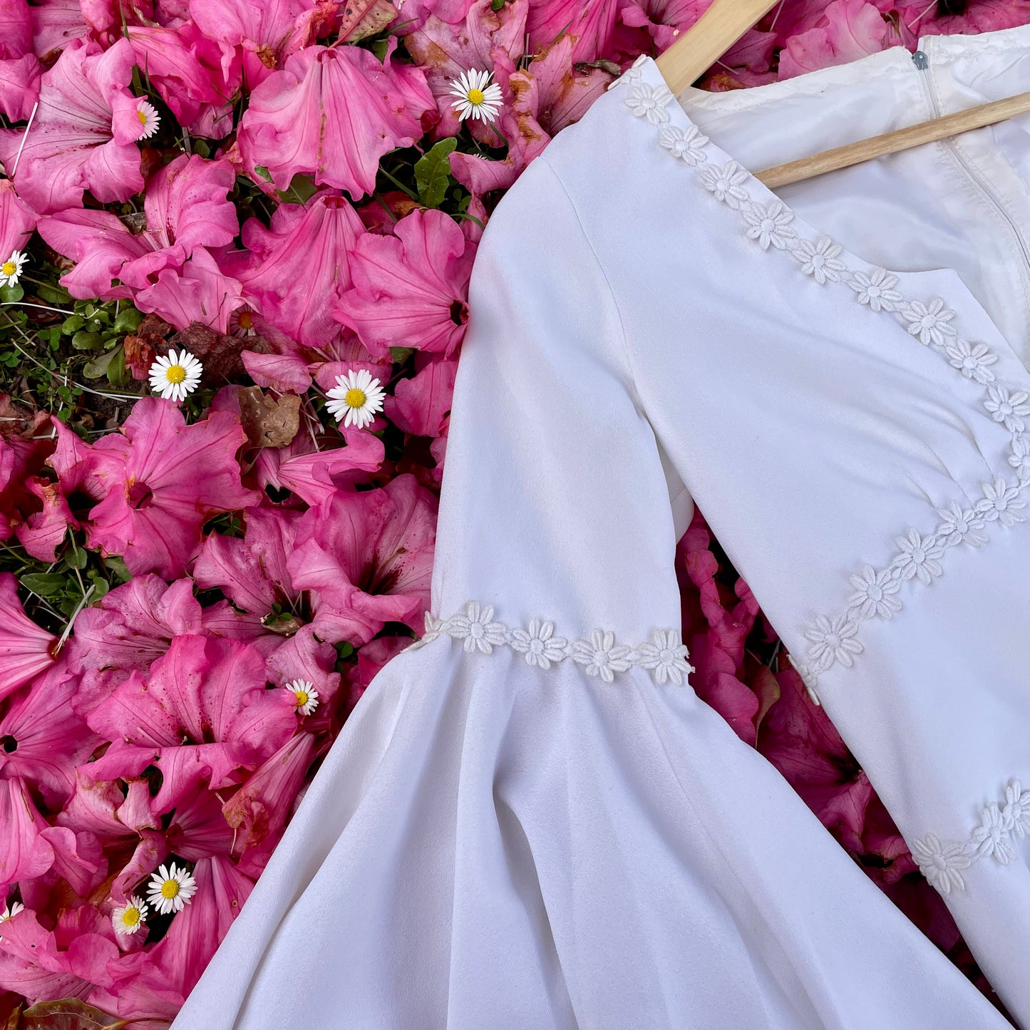 The Ophelia Dress - vintage 1970’s medieval style wedding dress with daisy chain details and bell sleeves