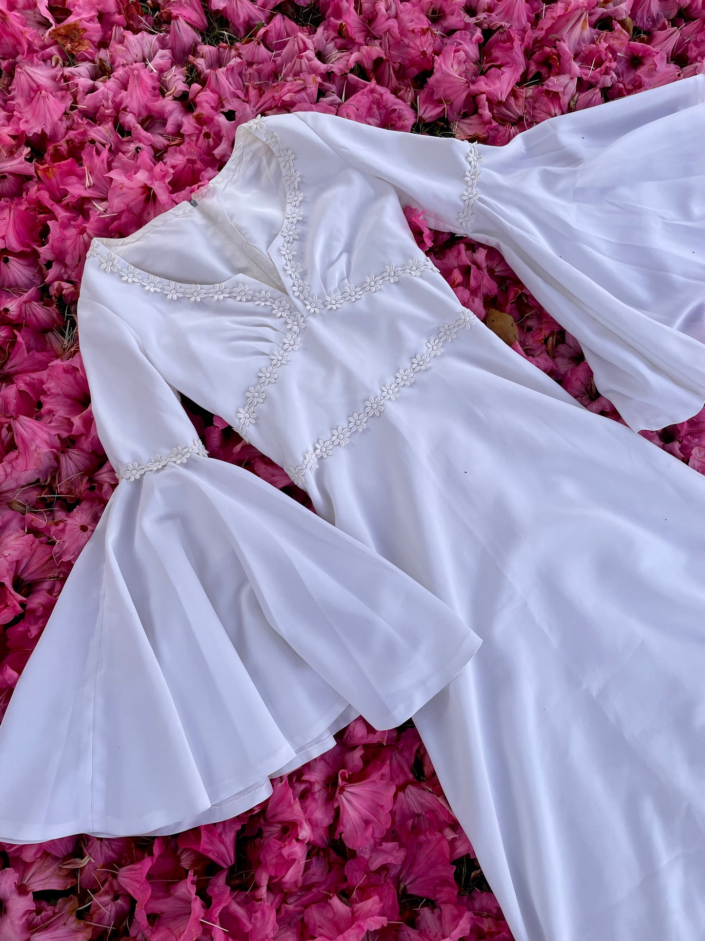 The Ophelia Dress - vintage 1970’s medieval style wedding dress with daisy chain details and bell sleeves