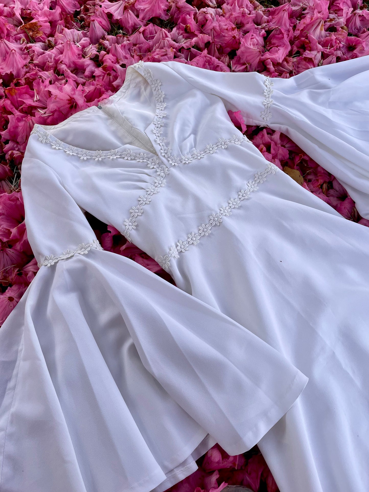 The Ophelia Dress - vintage 1970’s medieval style wedding dress with daisy chain details and bell sleeves