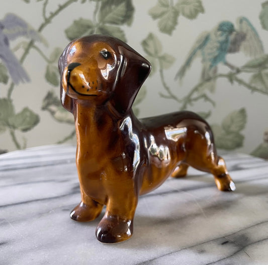 Vintage porcelain glass figurine of Dashund dog