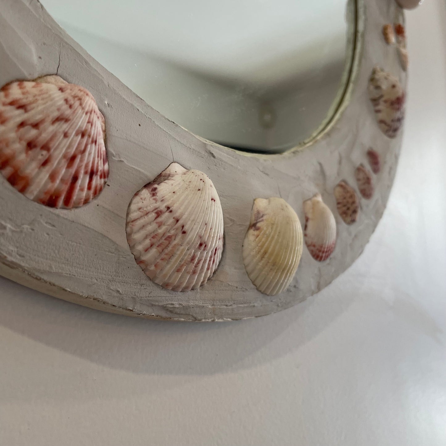 Shell Cottage - Round shell mirror with gray plaster