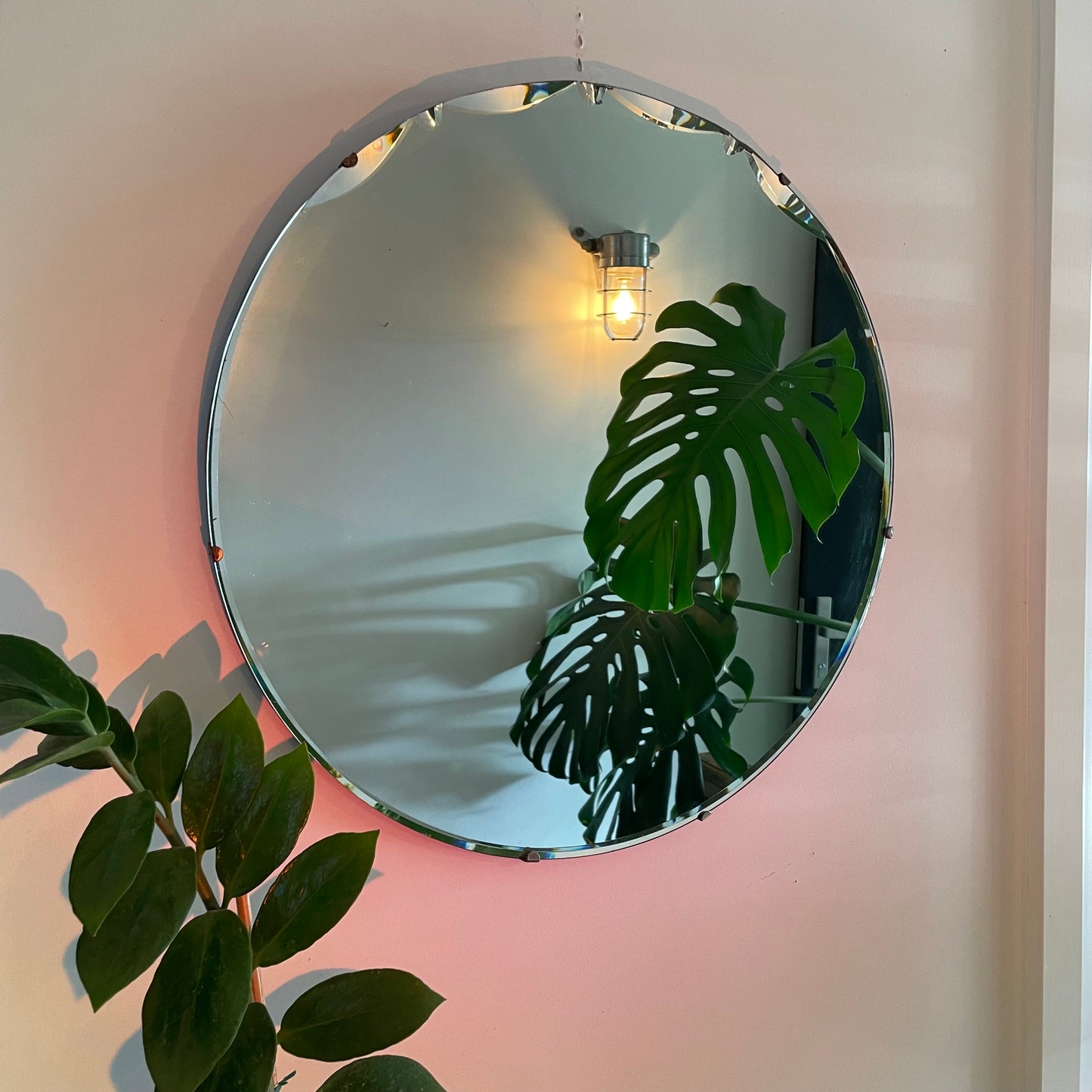 Large round antique Art Deco mirror with scalloped beveles