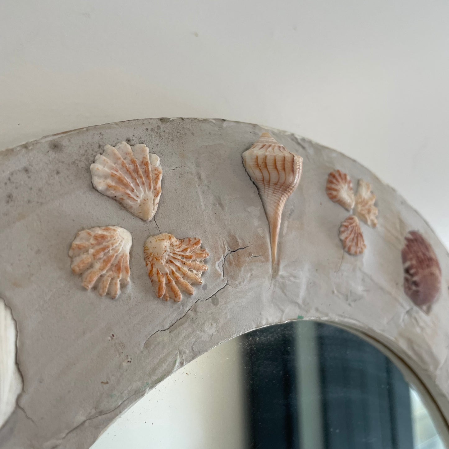 Shell Cottage - Round shell mirror with gray plaster