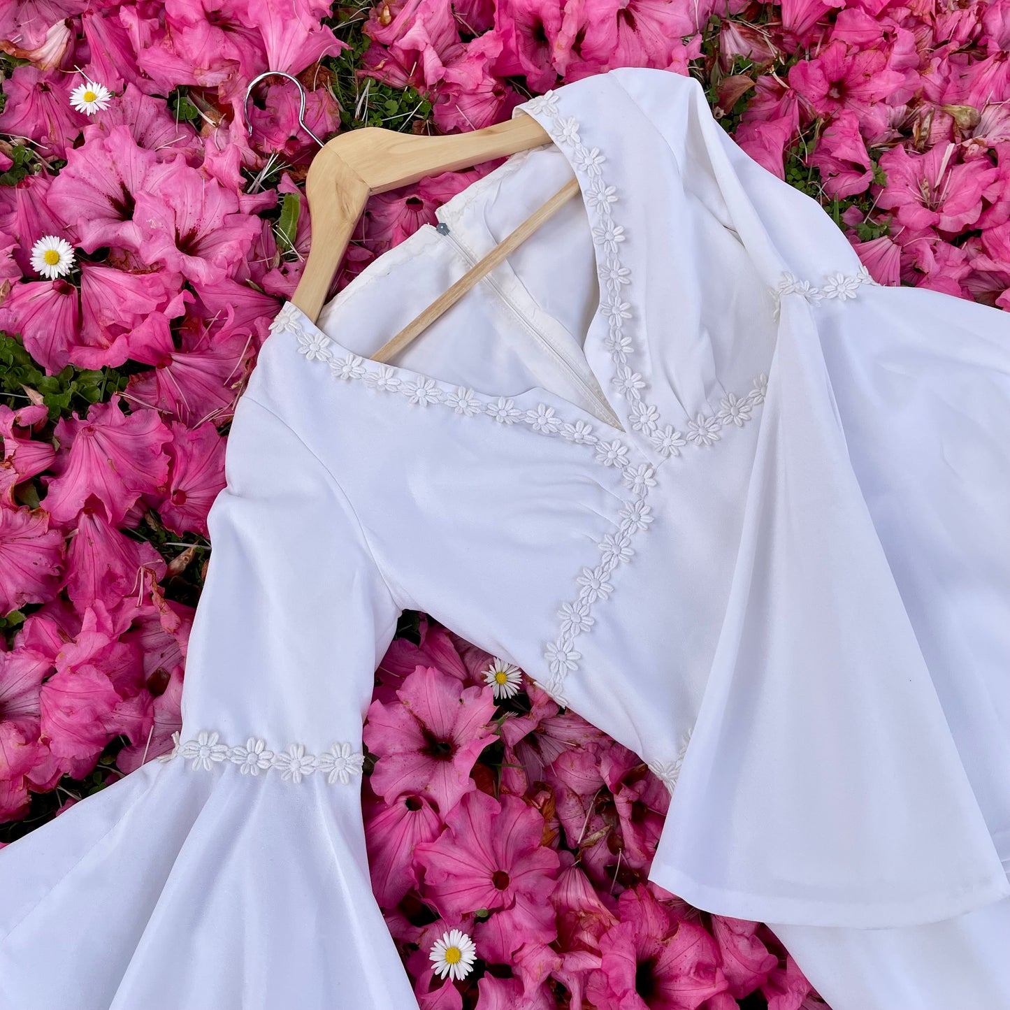 The Ophelia Dress - vintage 1970’s medieval style wedding dress with daisy chain details and bell sleeves