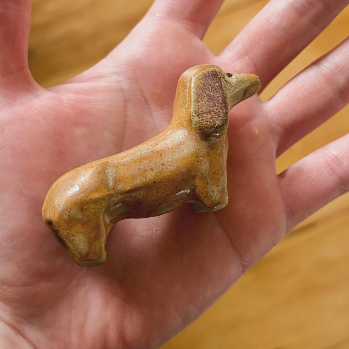 Adorable stoneware dachshund figurine