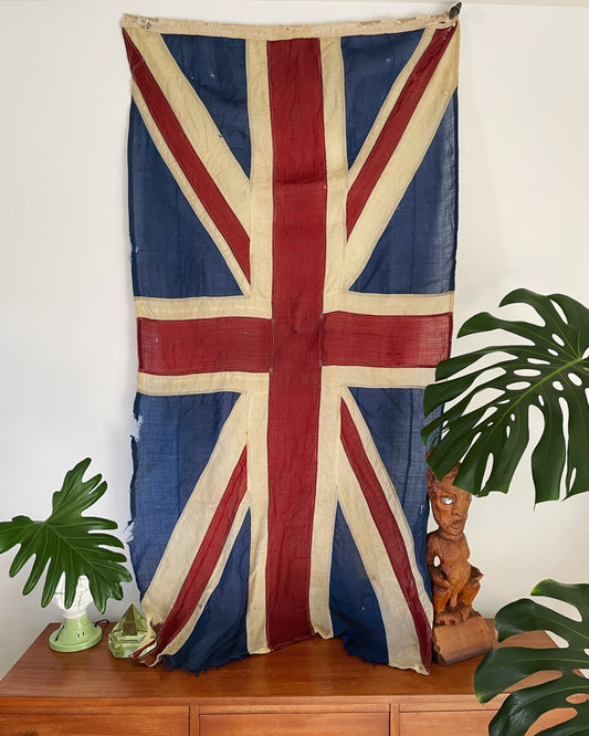 Vintage tattered United Kingdom Union Jack flag