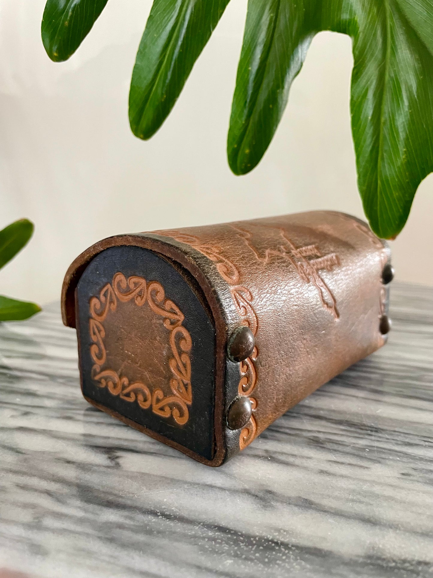 Vintage hand-tooled leather box with embossed Map of New Zealand and Māori designs