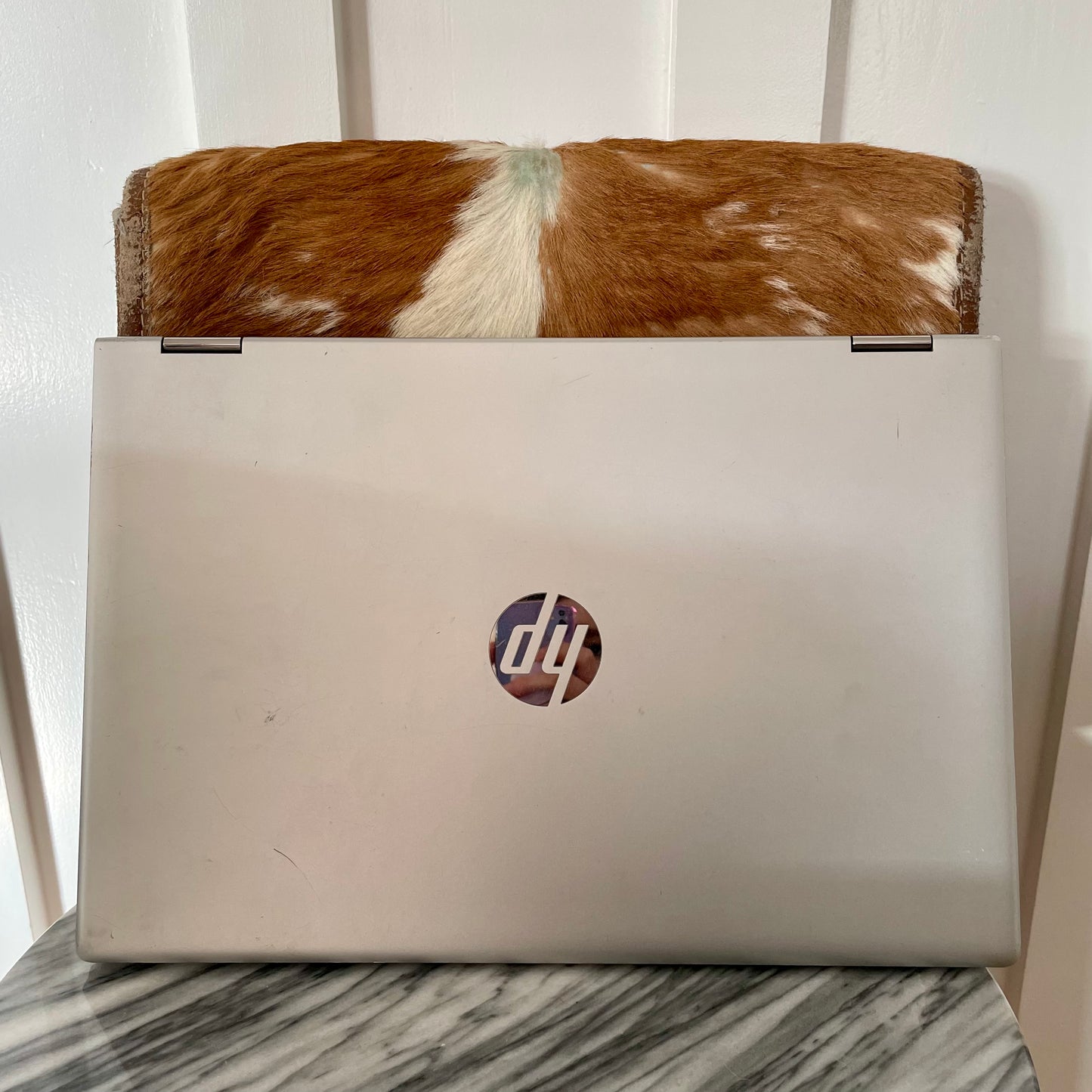 Vintage cowhide backpack - hair-on-hide leather messenger bag from New Zealand