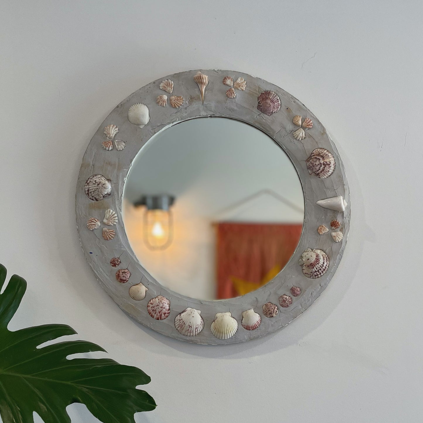 Shell Cottage - Round shell mirror with gray plaster