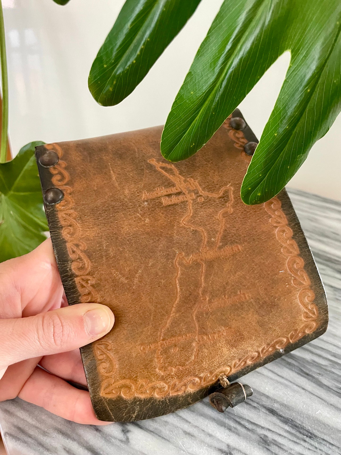 Vintage hand-tooled leather box with embossed Map of New Zealand and Māori designs