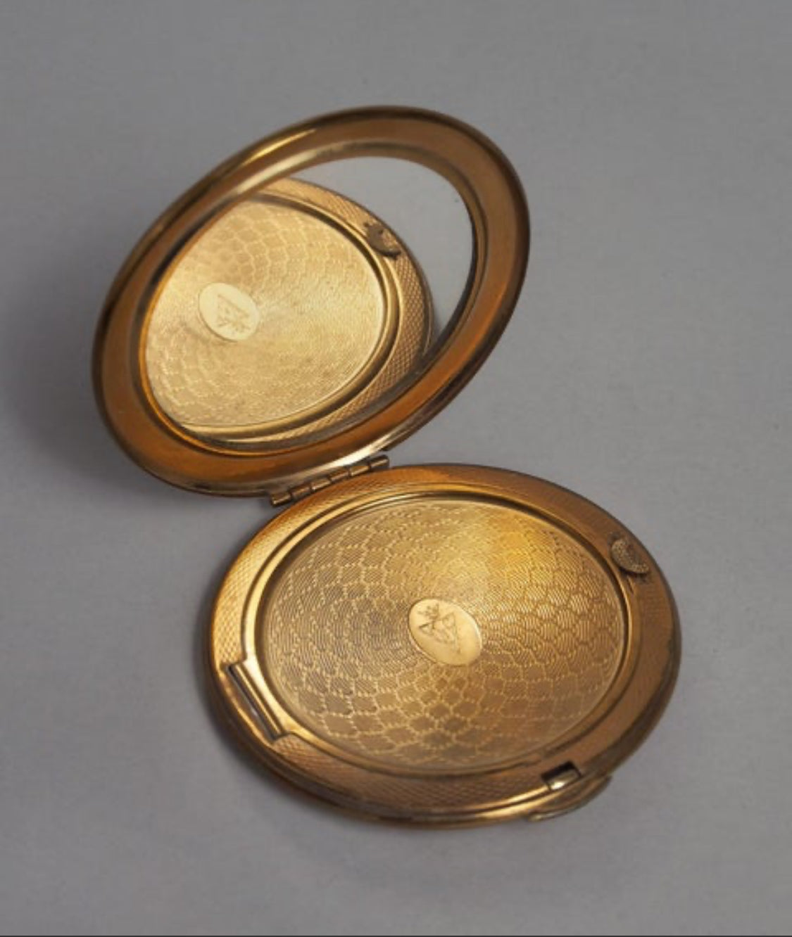 Antique brass compact mirror engraved with kiwi and map of New Zealand - souvenir makeup powder compact