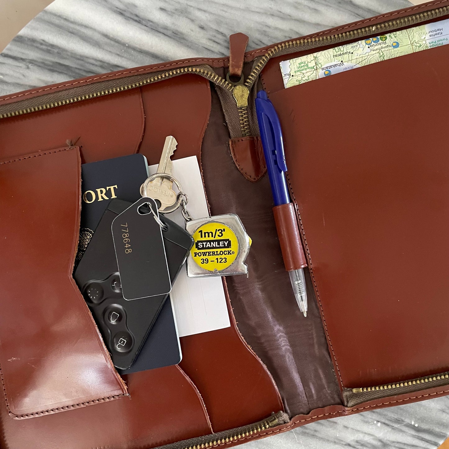 Vintage leather pocketbook embossed with a Māori chief from New Zealand / notebook cover writing case