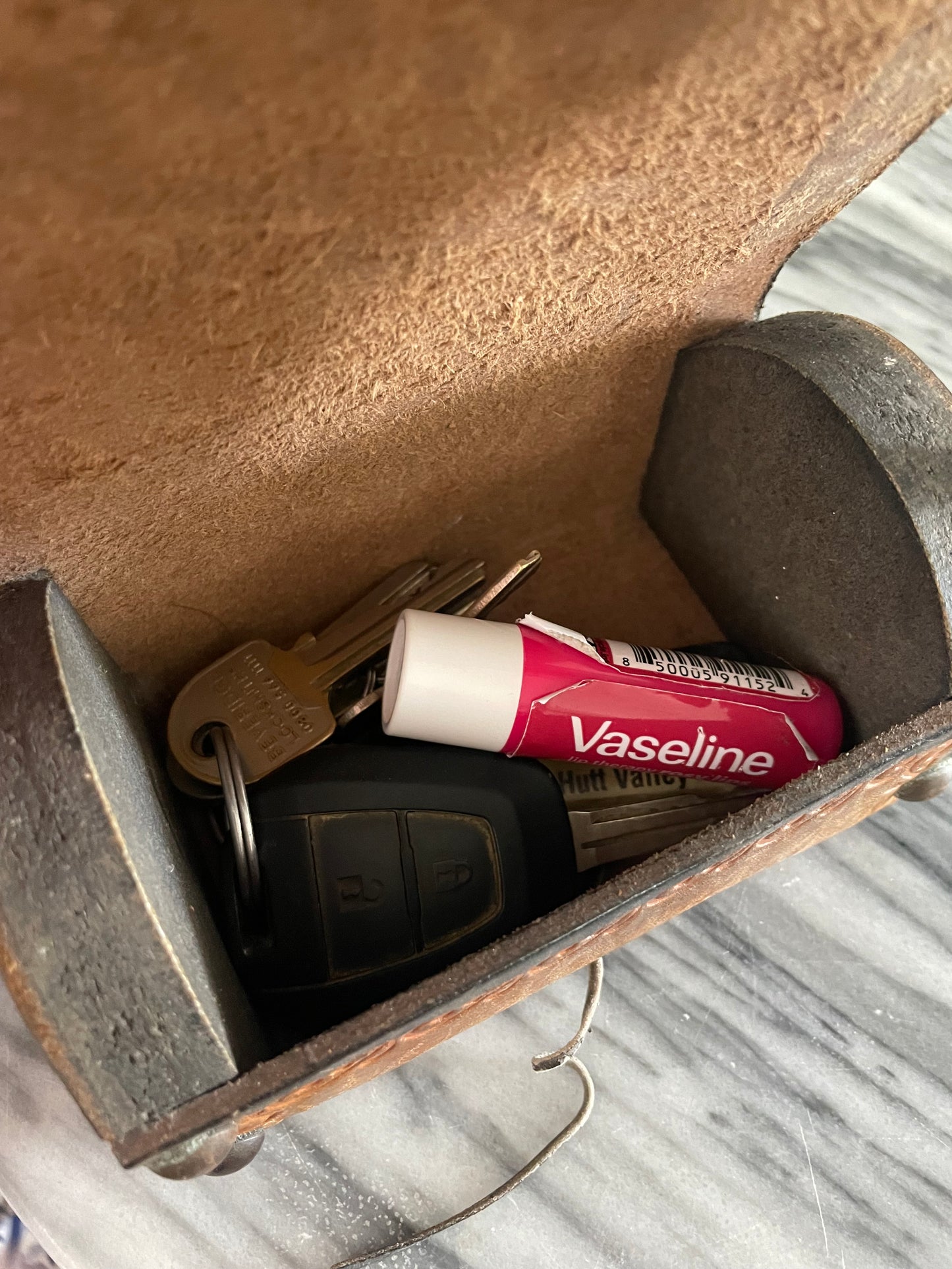 Vintage hand-tooled leather box with embossed Map of New Zealand and Māori designs