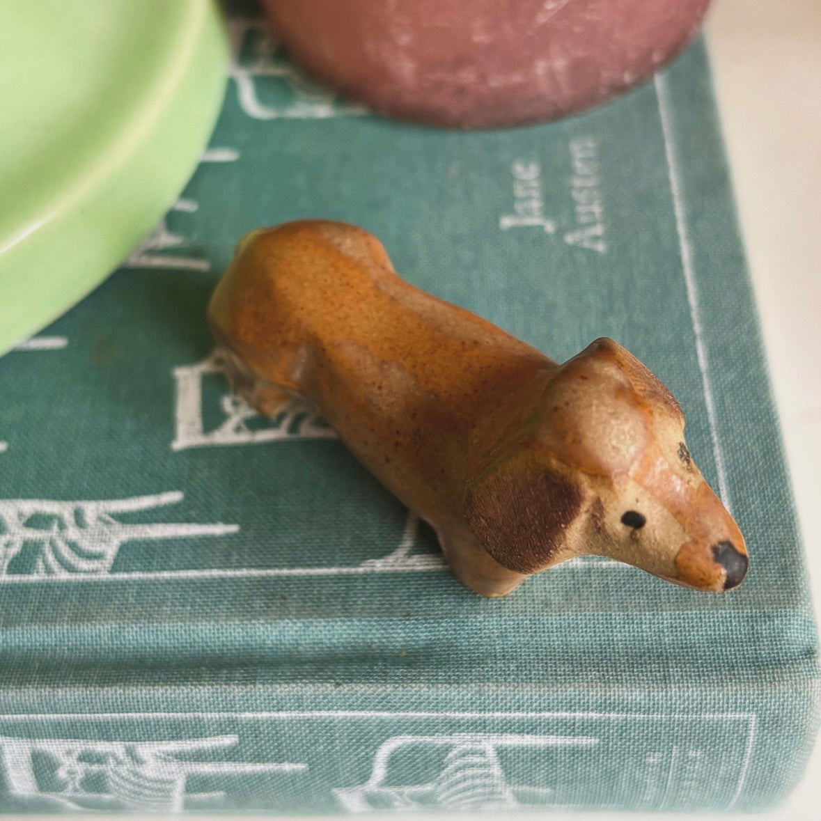 Adorable stoneware dachshund figurine