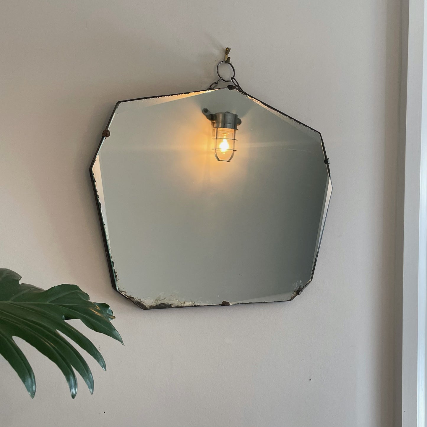Frameless Art Deco mirror with pointed top