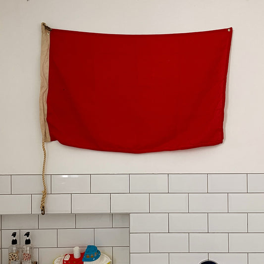 Vintage nautical ship flag from New Zealand - red signal flag
