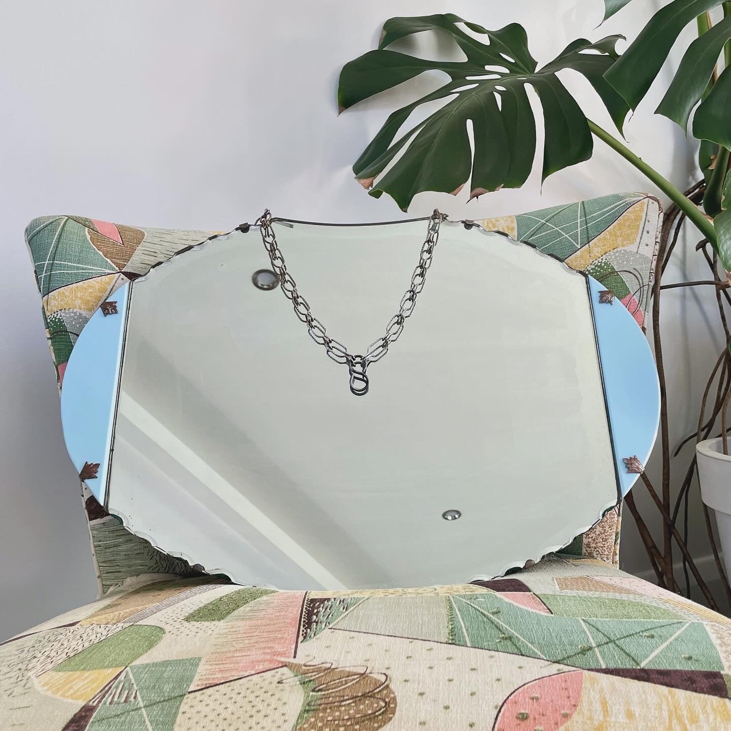 Art deco mirror with robins egg blue milk-glass panels