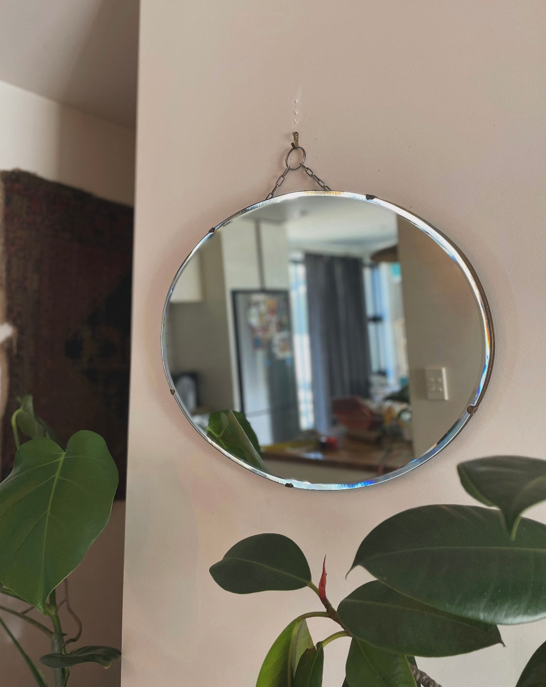 Antique oval Art Deco mirror with hanging chain