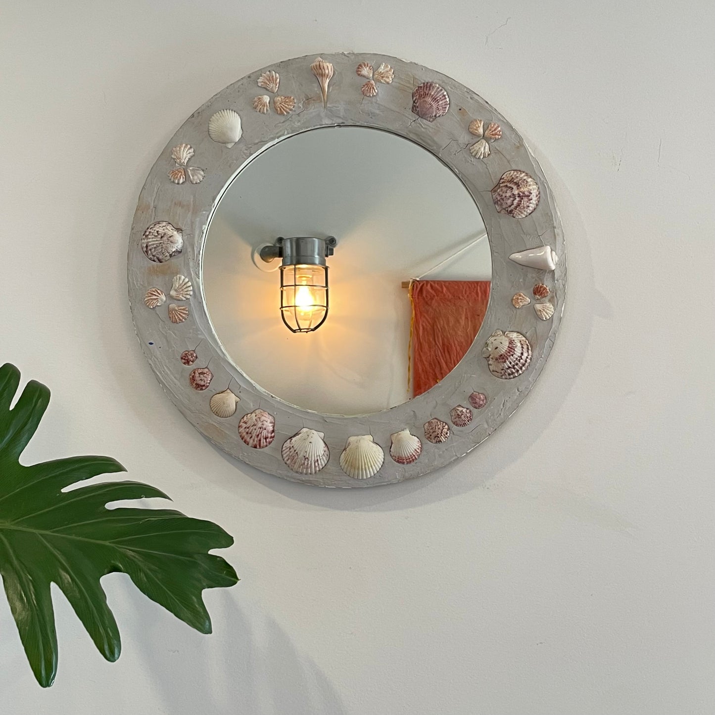 Shell Cottage - Round shell mirror with gray plaster