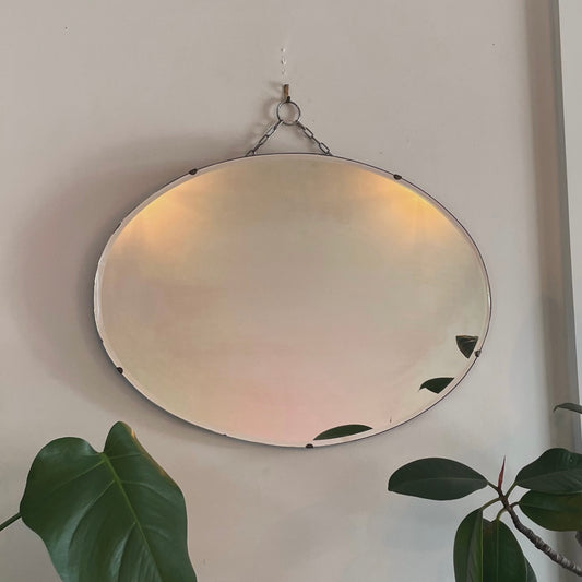 Antique oval Art Deco mirror with hanging chain