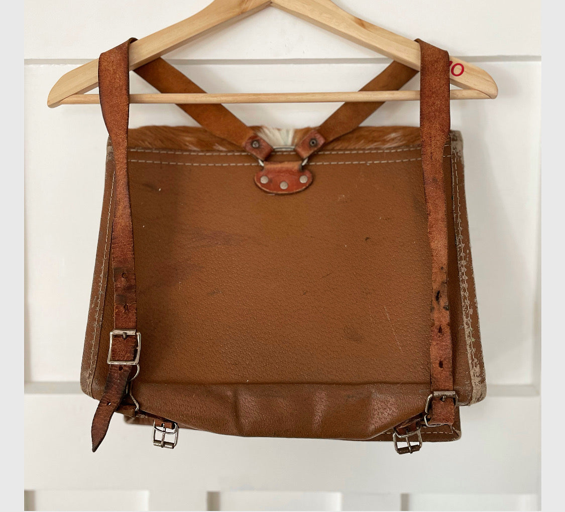 Vintage cowhide backpack - hair-on-hide leather messenger bag from New Zealand