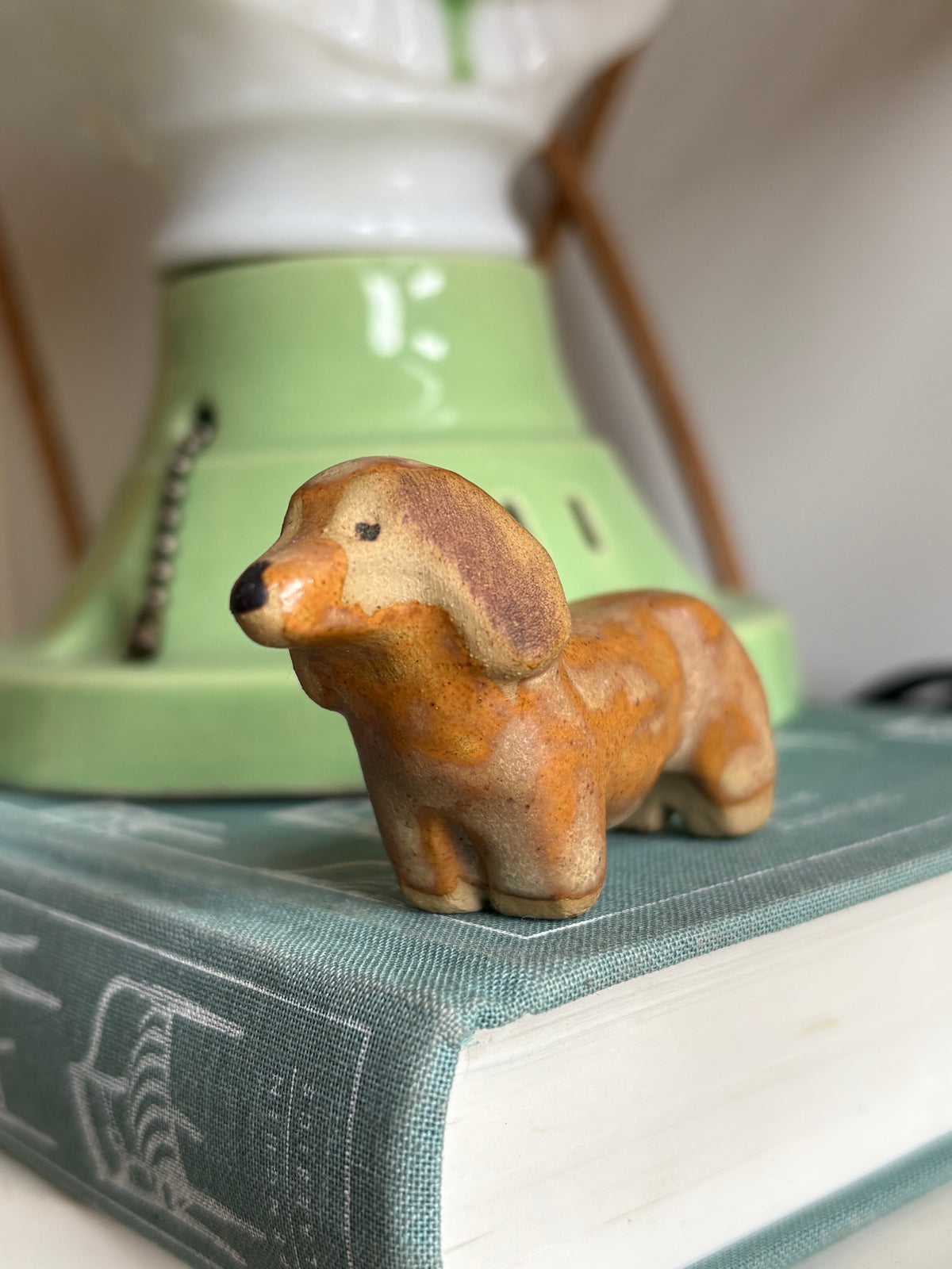 Adorable stoneware dachshund figurine