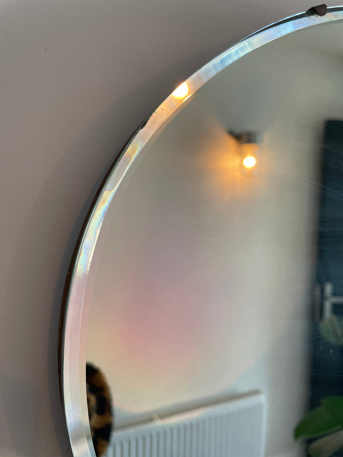Antique oval Art Deco mirror with hanging chain