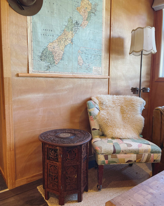 Octagonal hand-carved side table from India with bone inlay