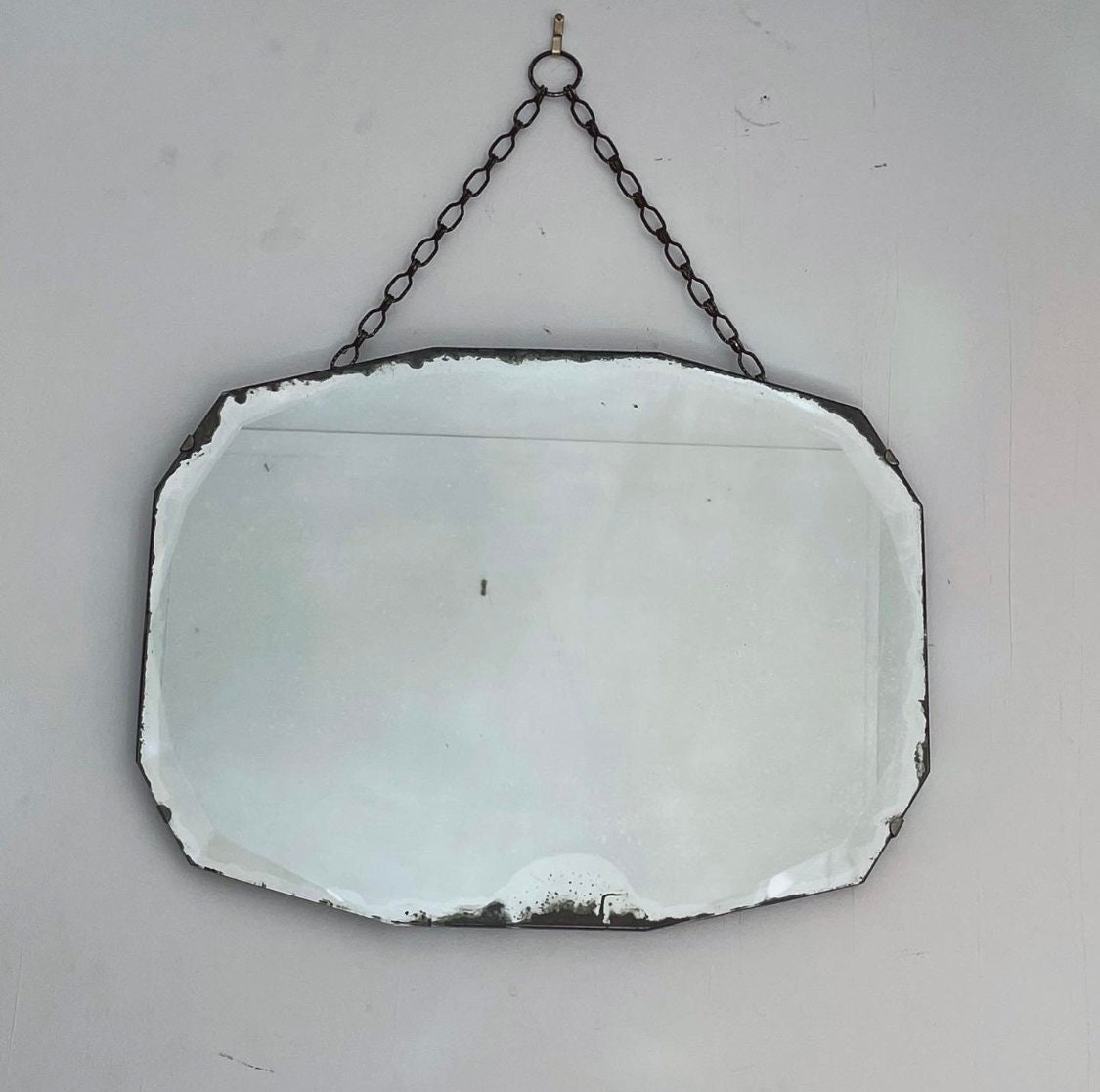 Distressed Antique Art Deco mirror with beveled edges