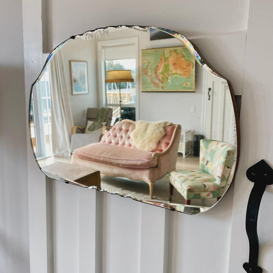 Large curved art deco antique mirror with beveled edges