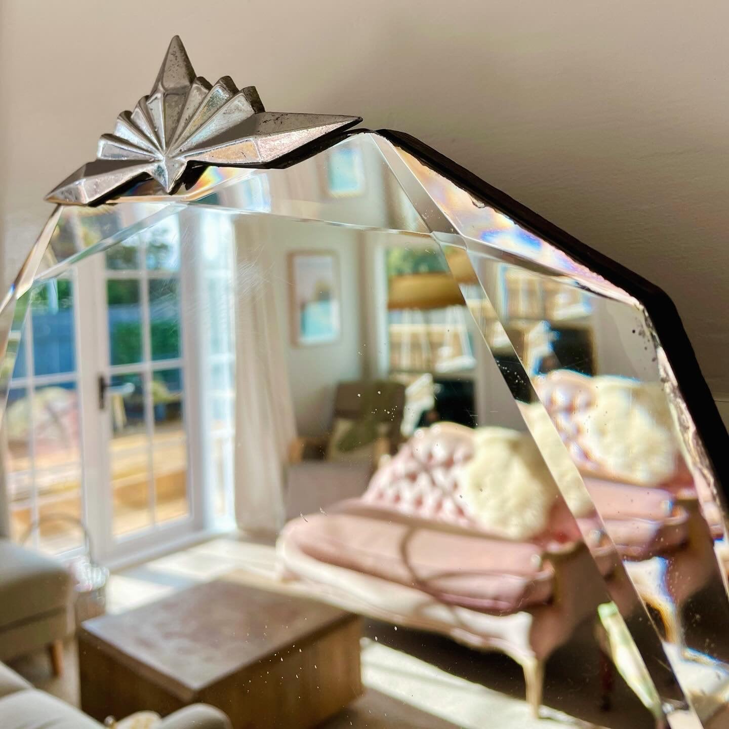 Stunning 12 sided Art Deco mirror with diamond faceted beveled edges and starburst crown topper