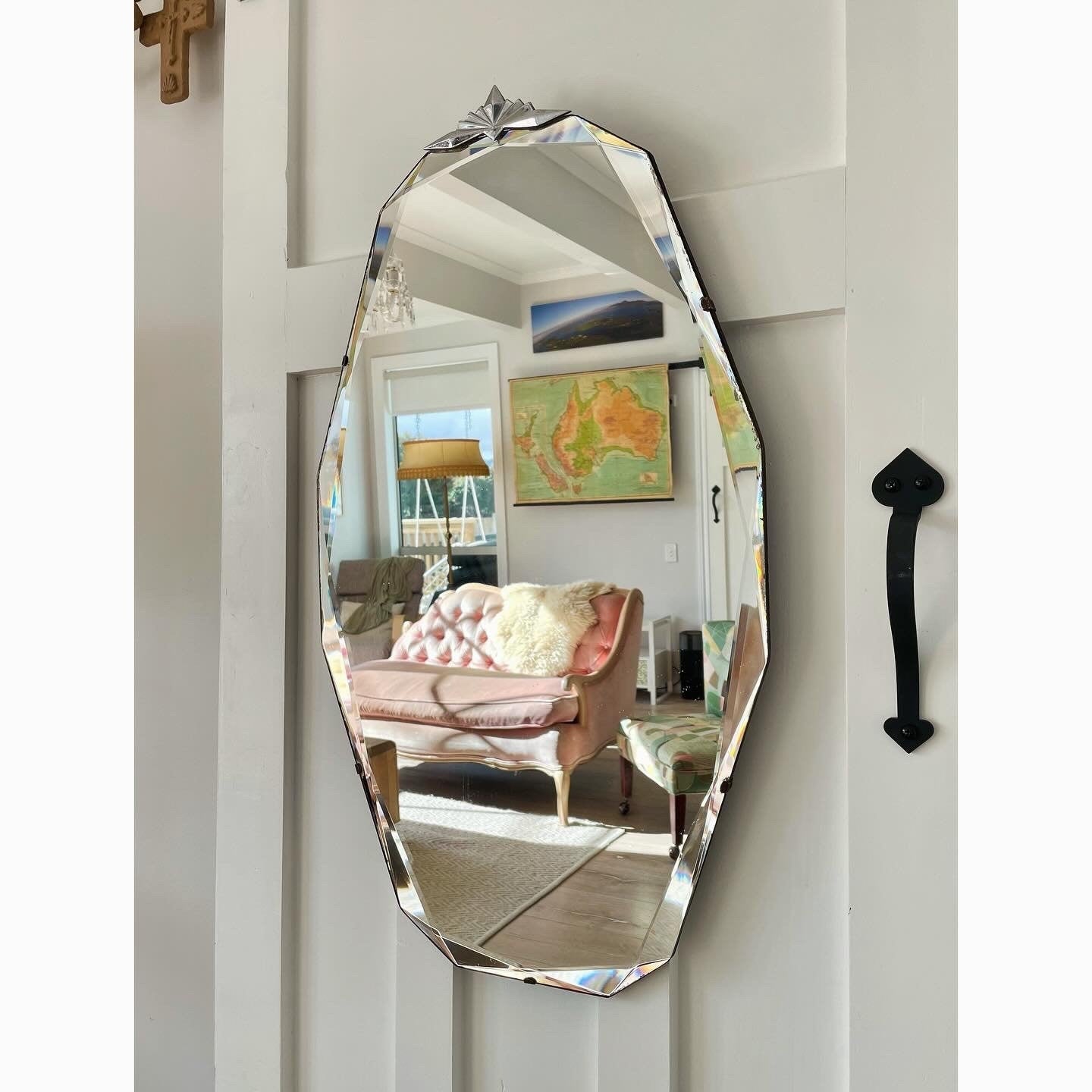 Stunning 12 sided Art Deco mirror with diamond faceted beveled edges and starburst crown topper